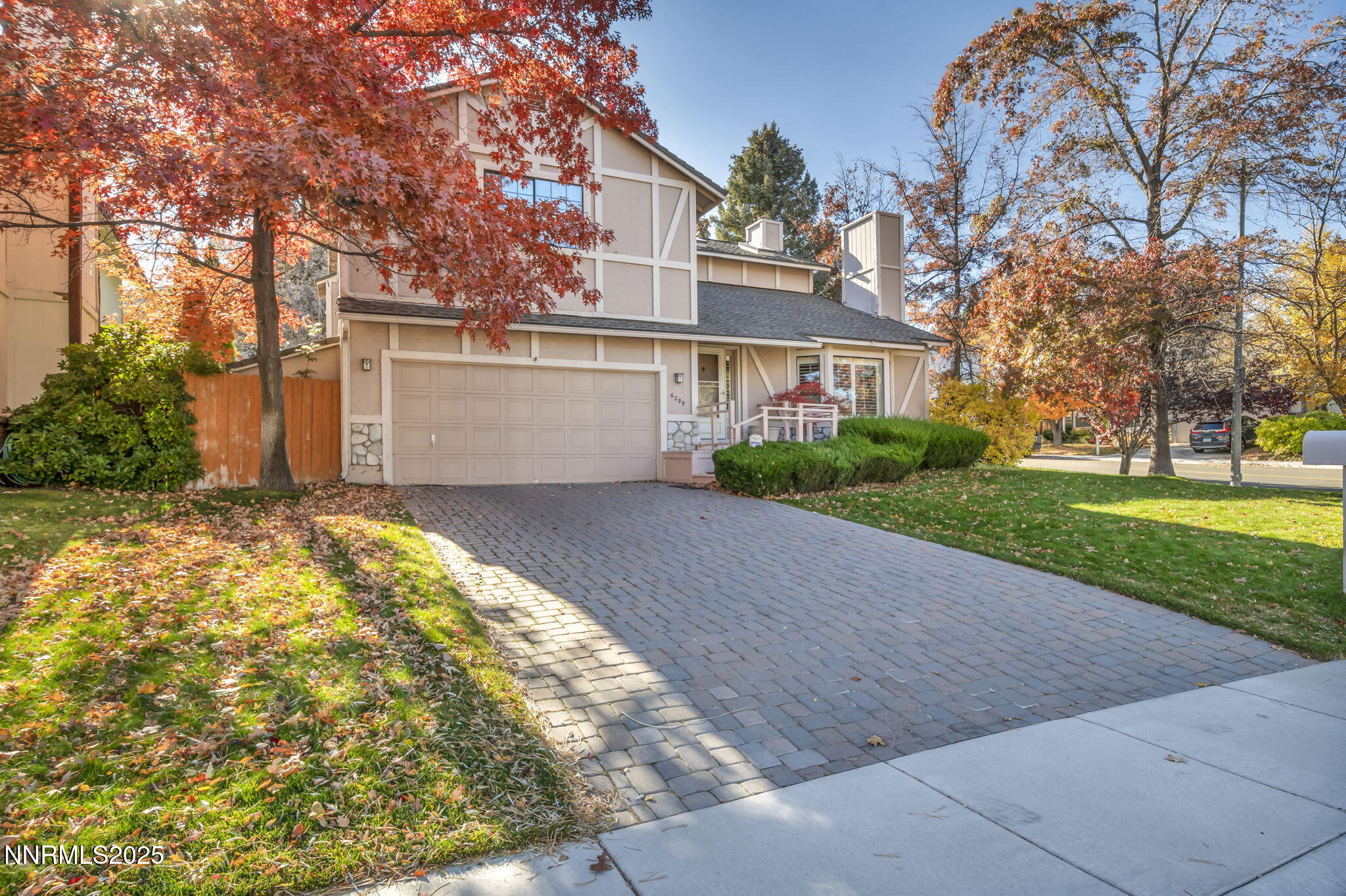 6299 Stone Valley Drive Reno, NV 89523 - Photo 63 of 70 a front view of a house with a yard