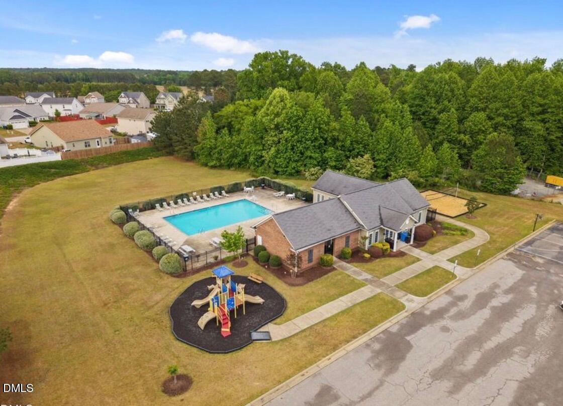 205 Battery Way Bunnlevel, NC 28323 - Photo 36 of 37 an aerial view of a house with yard swimming pool and outdoor seating