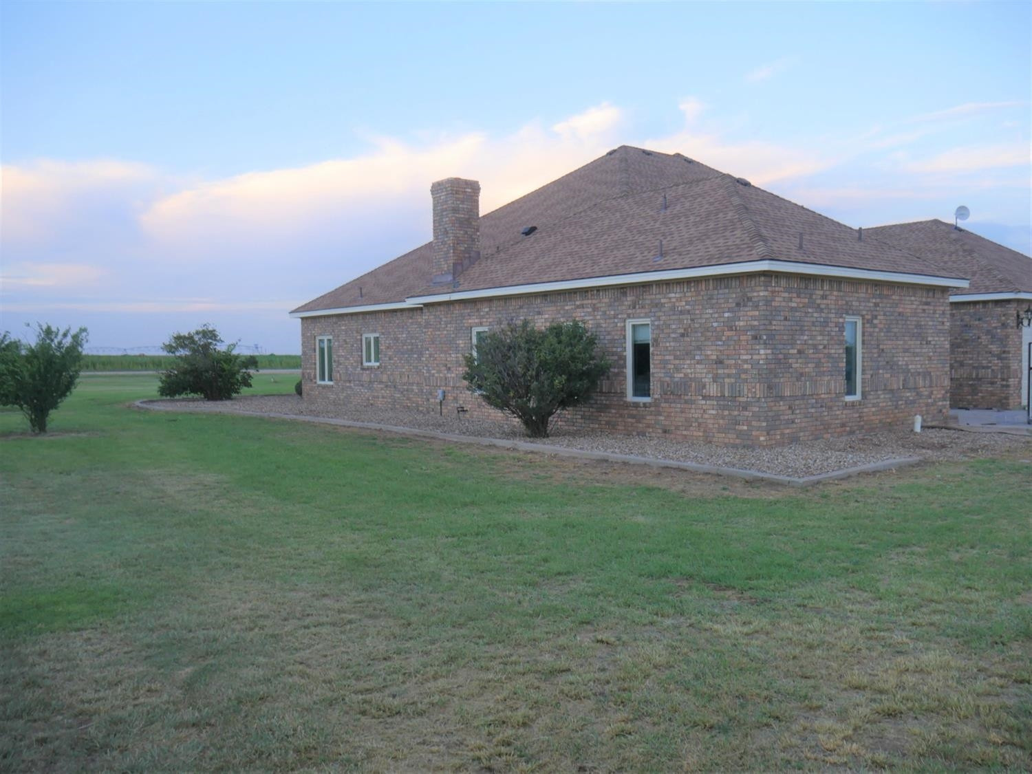 1819 County Road 130 Plainview, TX 79072 - Photo 19 of 24 front view of house with a yard