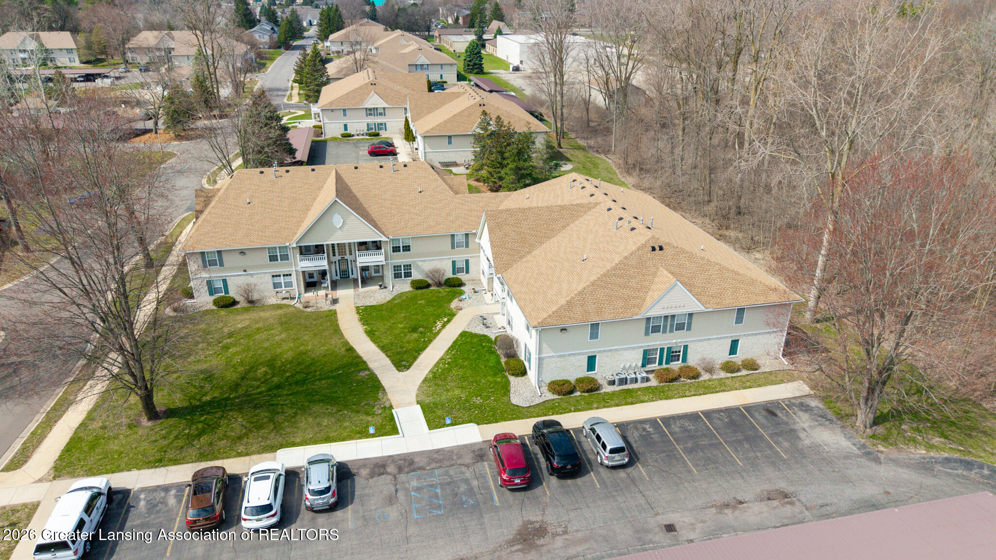 4452 Cricket Ridge Drive, Unit 202 Holt, MI 48842 - Photo 2 of 18 4452_Crickets_Ridge_#202_CLIFF-9