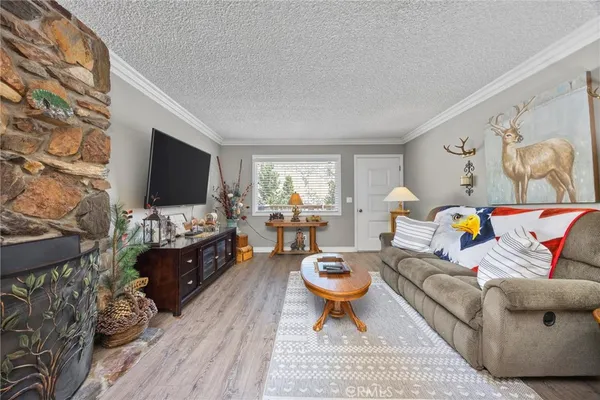 a kitchen with stainless steel appliances a sink stove and cabinets