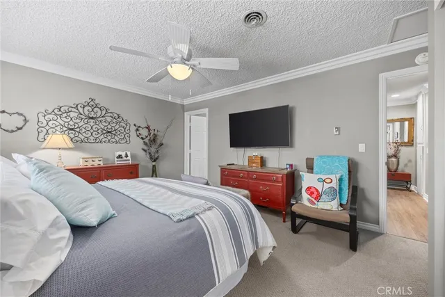 a room with furniture and flat screen tv