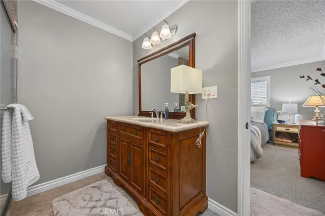a view of a dirt road with a building in the background