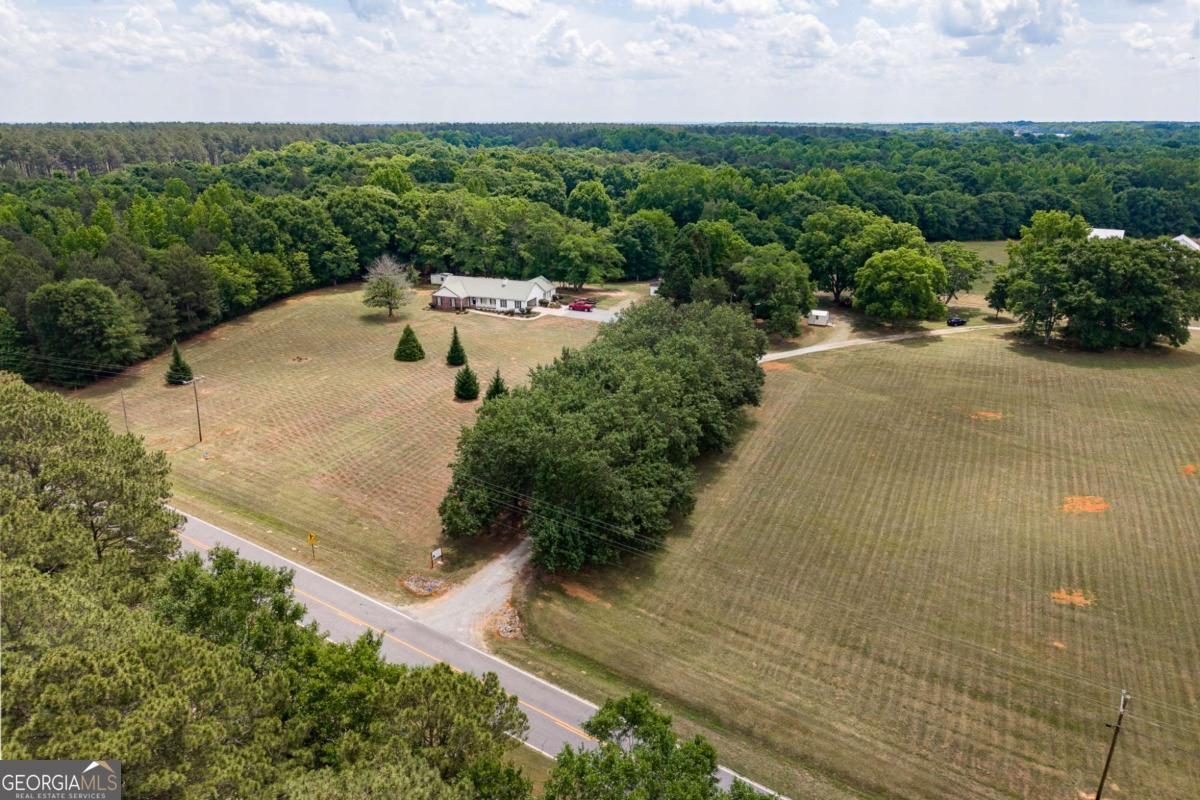 6.04-acres Old Bishop Road Bishop, GA 30621 - Photo 5 of 30 an aerial view of a houses with yard