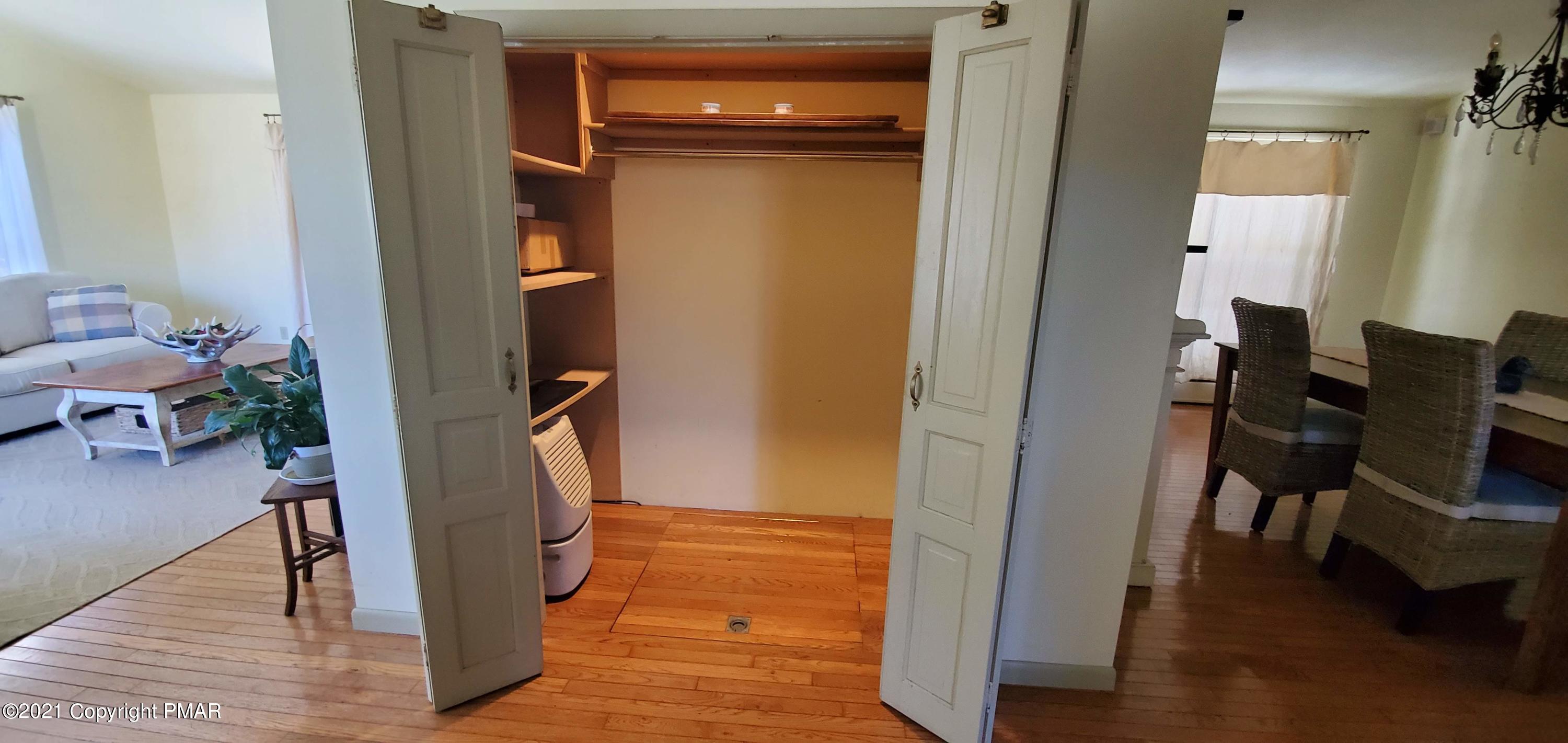 529 Heyer Mill Road Nazareth, PA 18064 - Photo 26 of 70 a view of a hallway with furniture and wooden floor