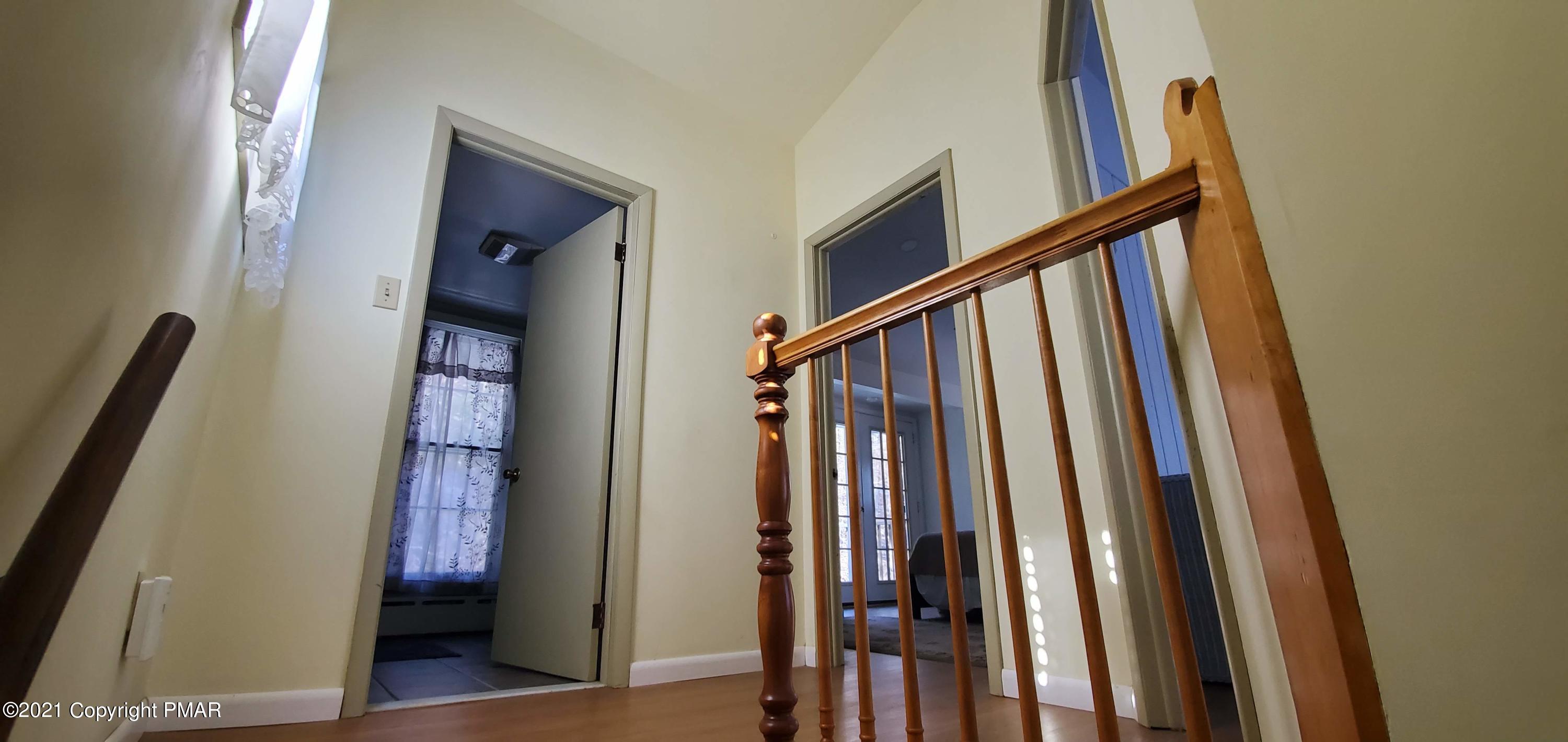 529 Heyer Mill Road Nazareth, PA 18064 - Photo 44 of 70 a view of a hallway with wooden floor and entryway