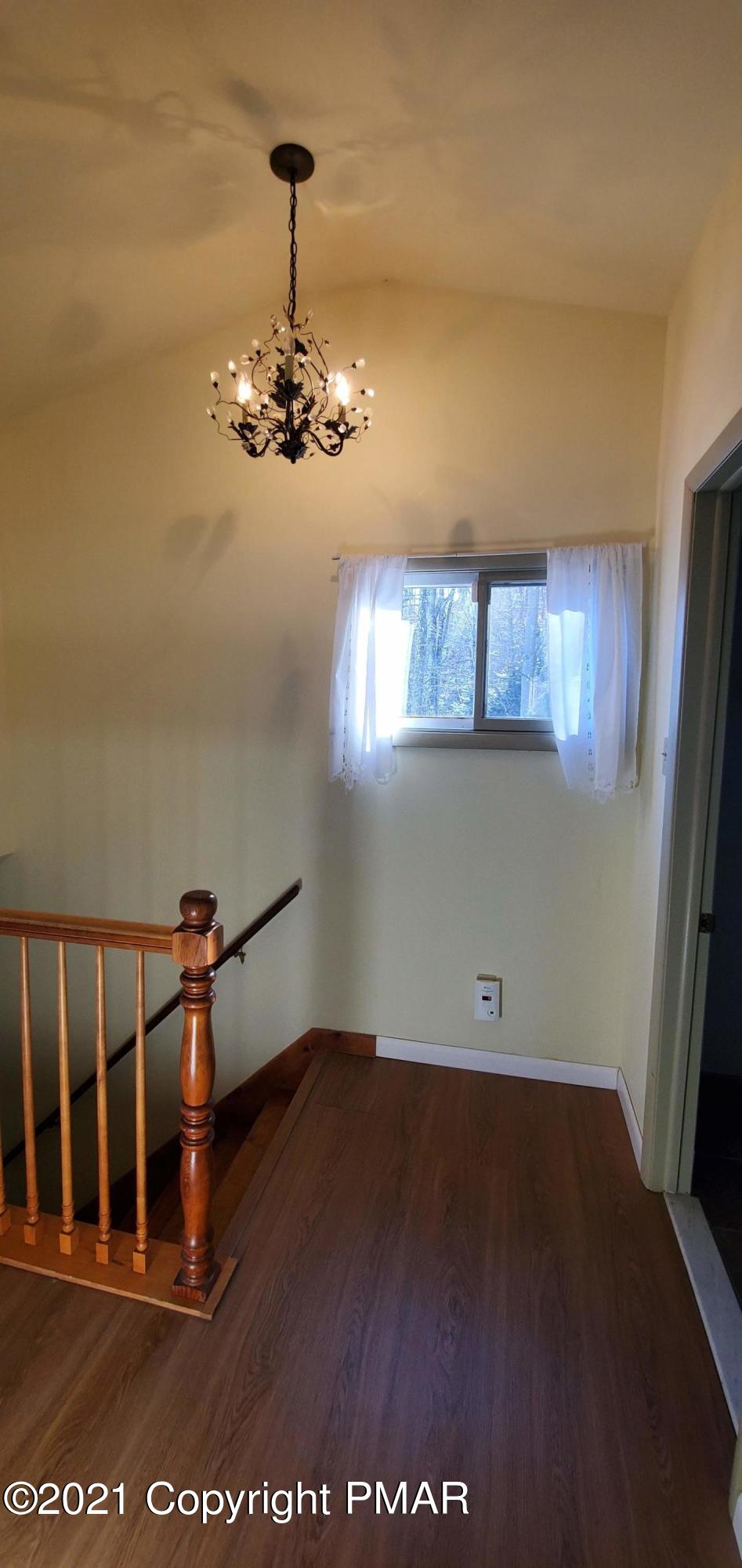 529 Heyer Mill Road Nazareth, PA 18064 - Photo 46 of 70 wooden floor in an empty room with a window