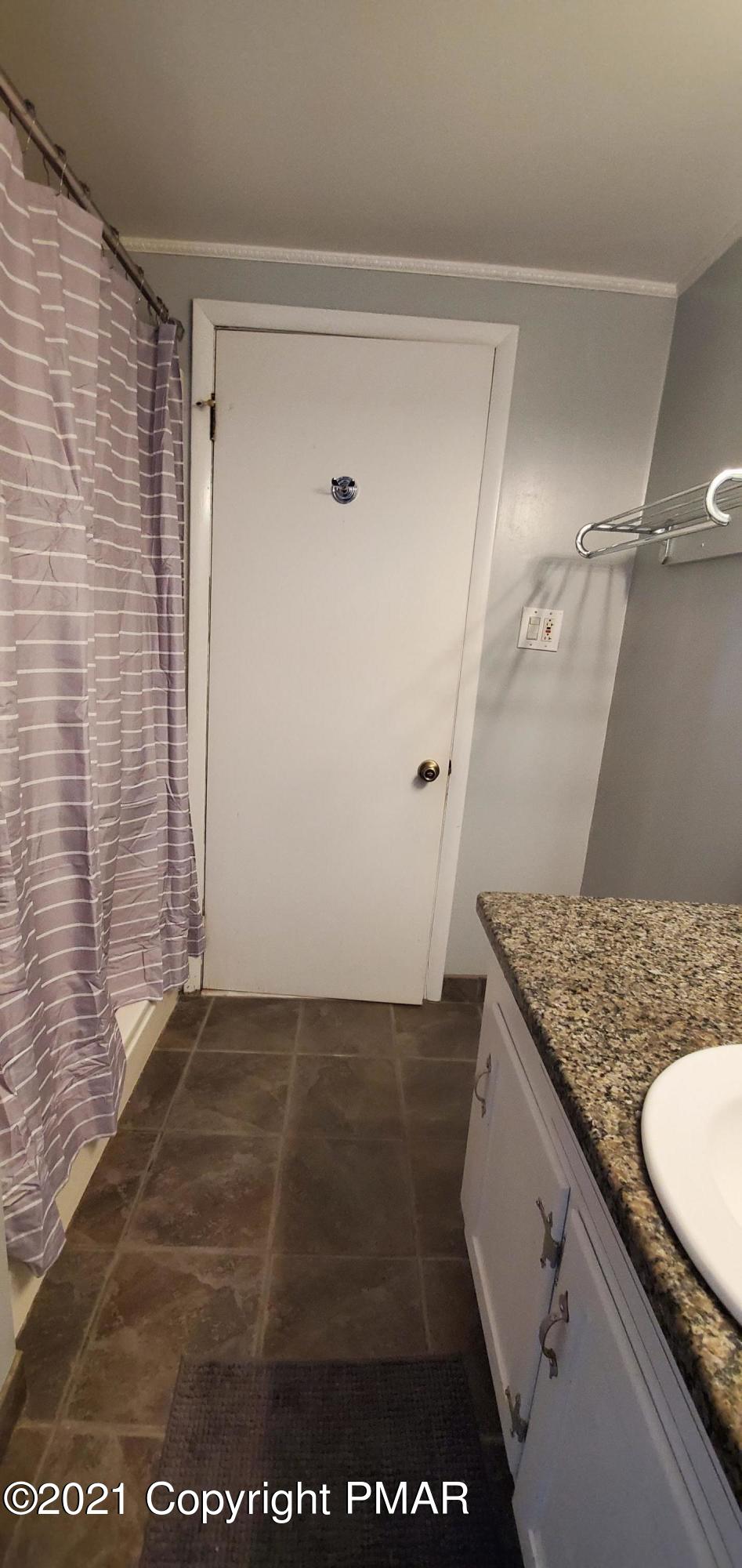 529 Heyer Mill Road Nazareth, PA 18064 - Photo 60 of 70 a bathroom with a granite countertop sink and a mirror