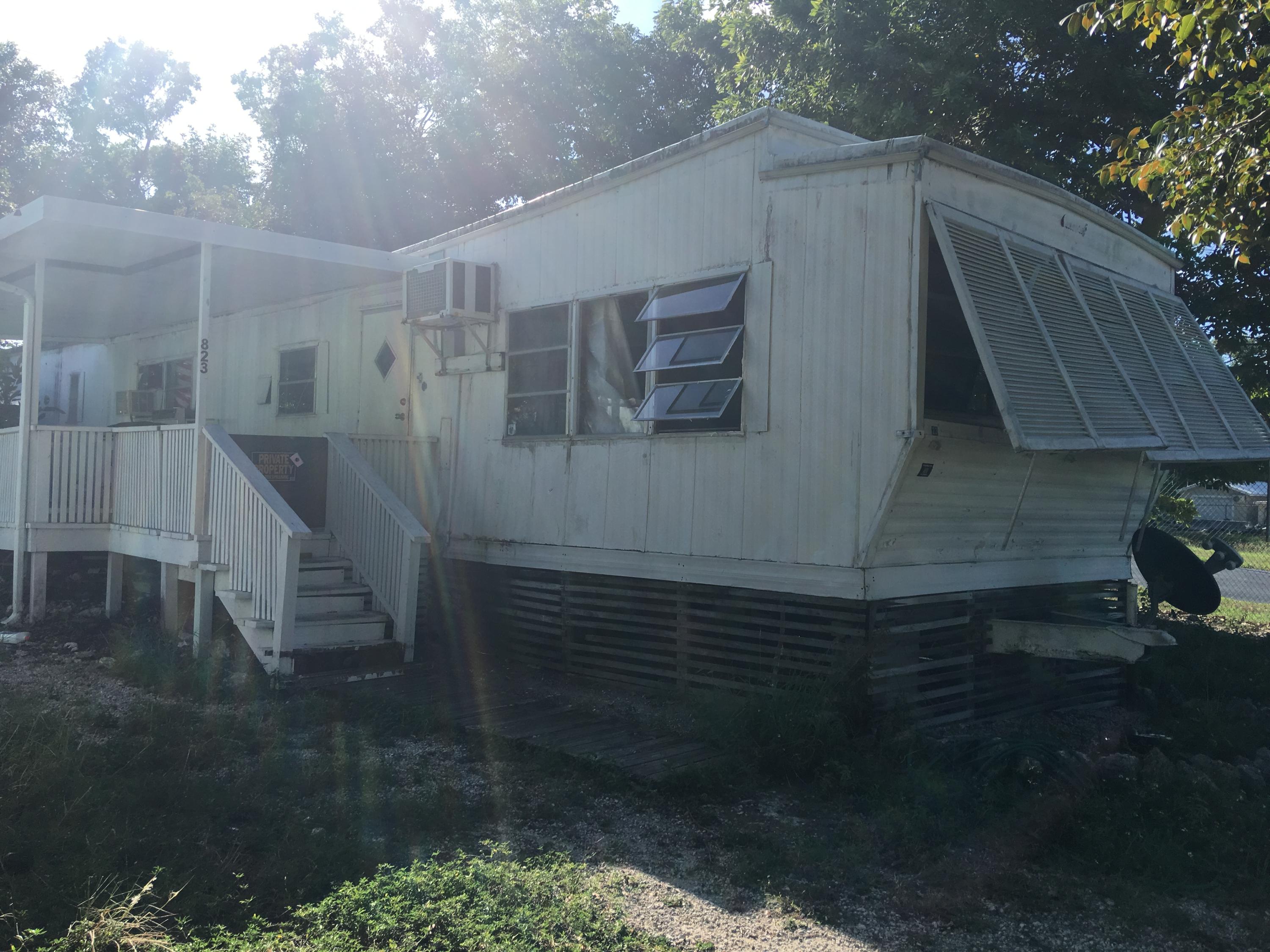 823 Largo Road Key Largo, FL 33037 - Photo 4 of 7 Side View