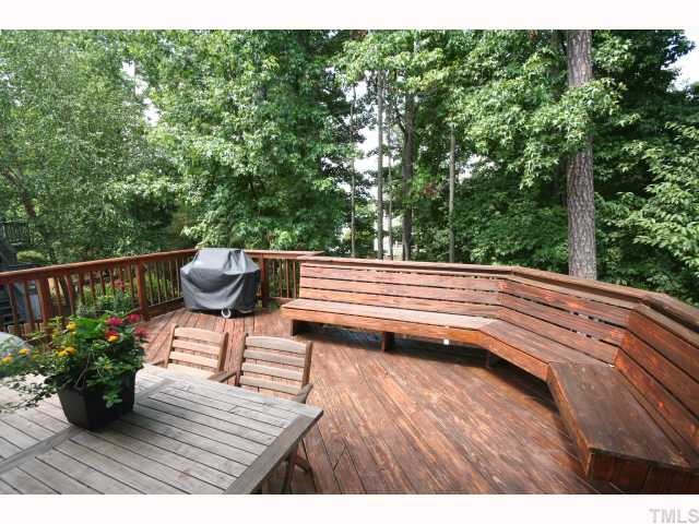 8509 Guerro Court Raleigh, NC 27613 - Photo 12 of 12 Large back deck with built-in seating
