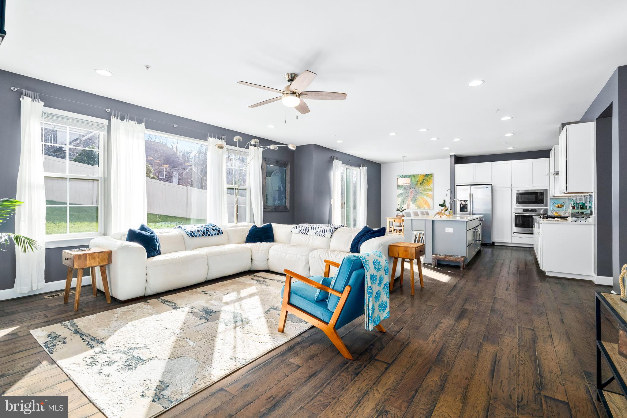 9915 Arapahoe Road New Market, MD 21774 - Photo 12 of 81 a living room with furniture and a large window