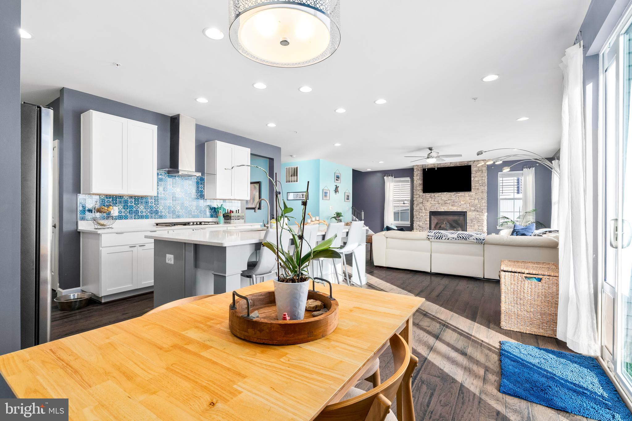 9915 Arapahoe Road New Market, MD 21774 - Photo 15 of 81 a kitchen with a table and chairs
