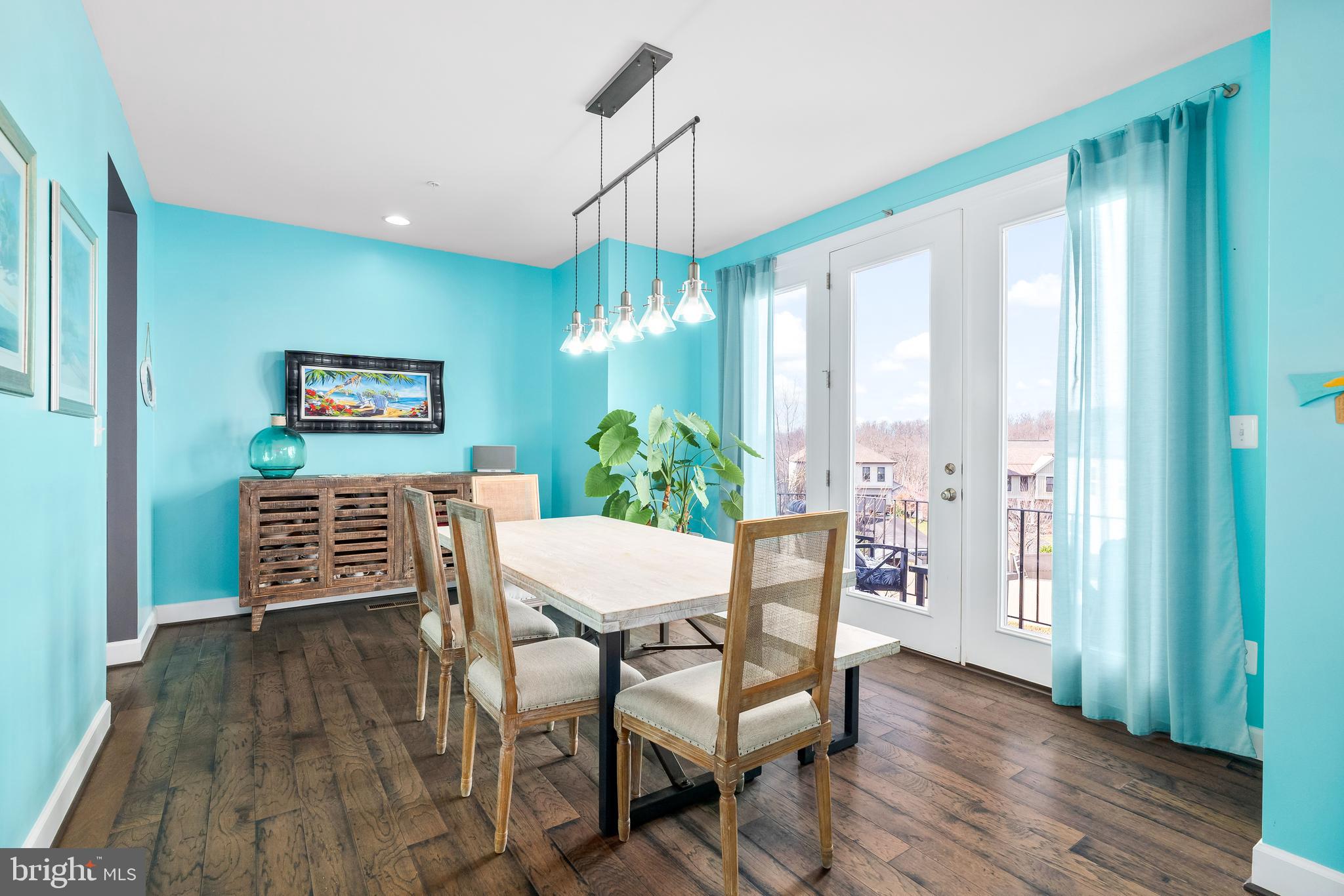9915 Arapahoe Road New Market, MD 21774 - Photo 23 of 81 a view of a dining room with furniture window and wooden floor