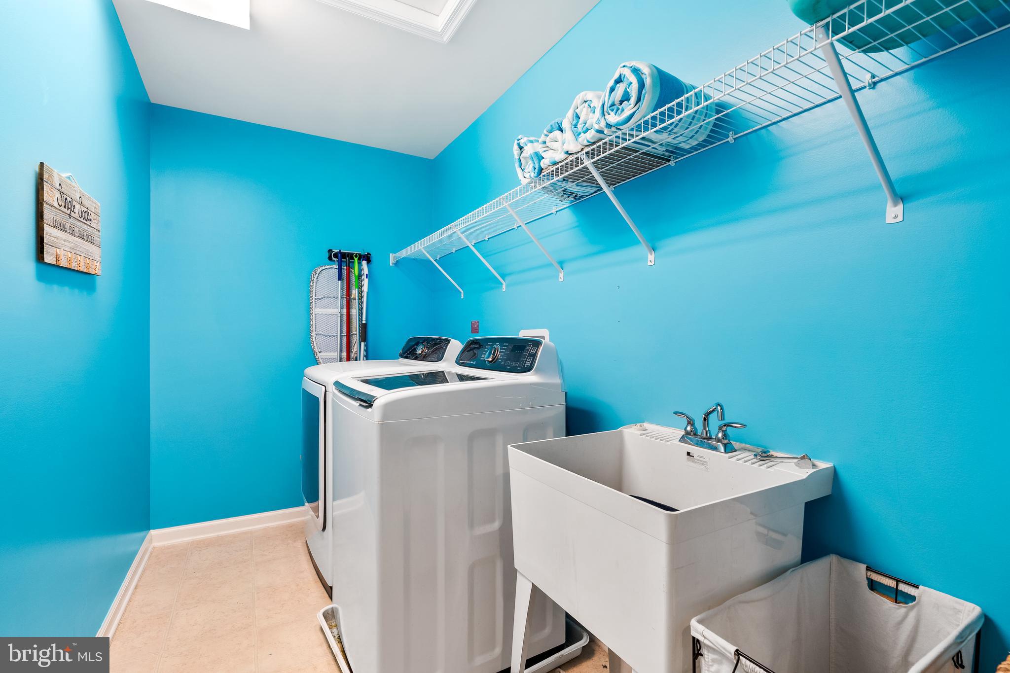 9915 Arapahoe Road New Market, MD 21774 - Photo 30 of 81 a bathroom with a sink and mirror