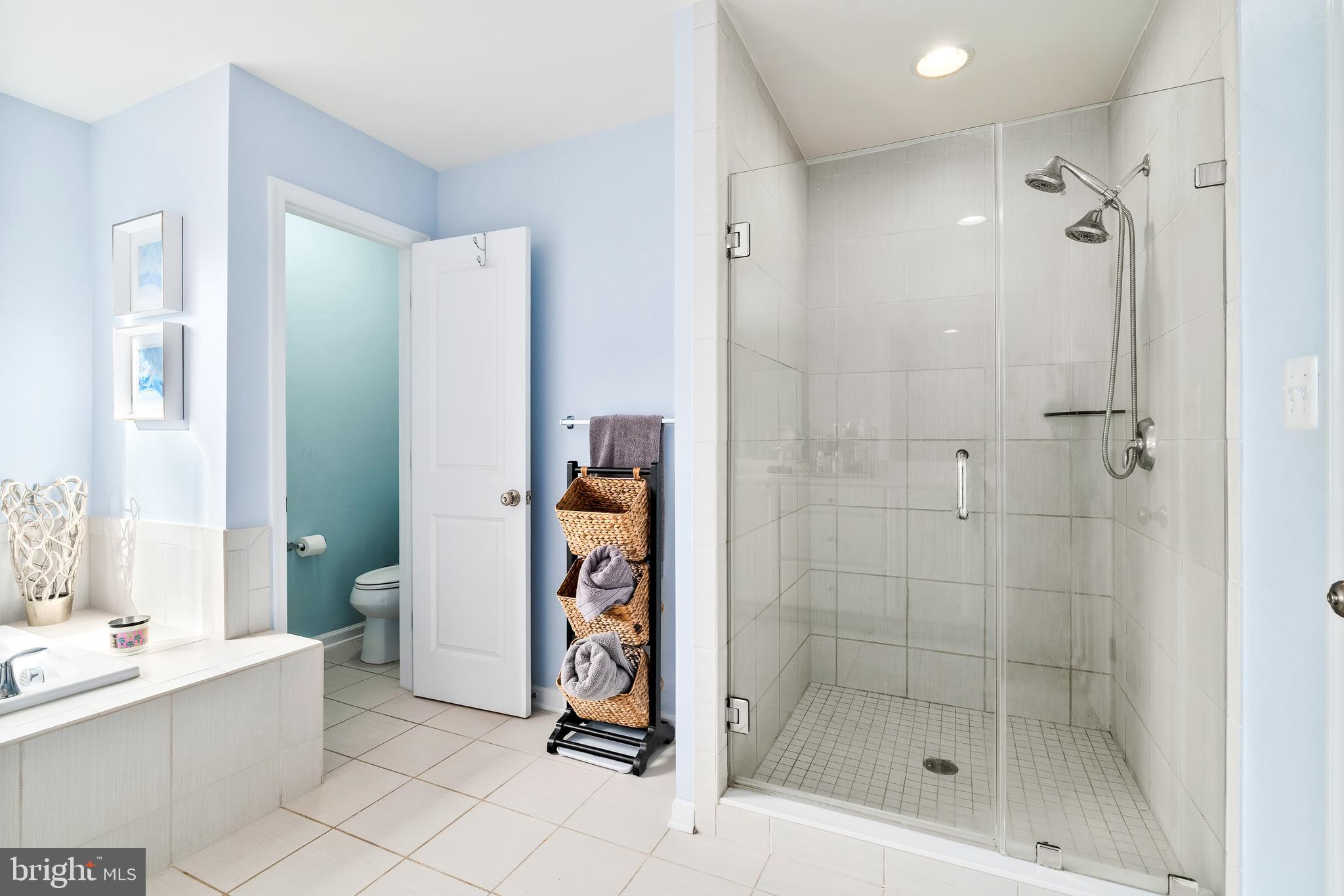 9915 Arapahoe Road New Market, MD 21774 - Photo 35 of 81 a bathroom with a shower and a sink