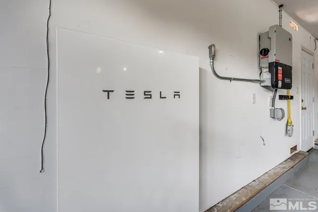 a picture of door and utility room with wooden floor
