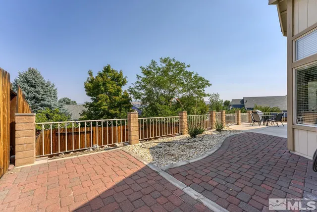 a swimming pool with wooden fence