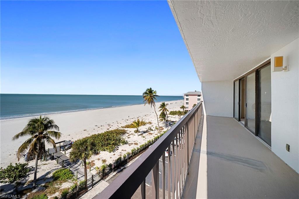 26300 Hickory Boulevard, Unit 503 Bonita Springs, FL 34134 - Photo 40 of 50 Balcony featuring view of water and beach
