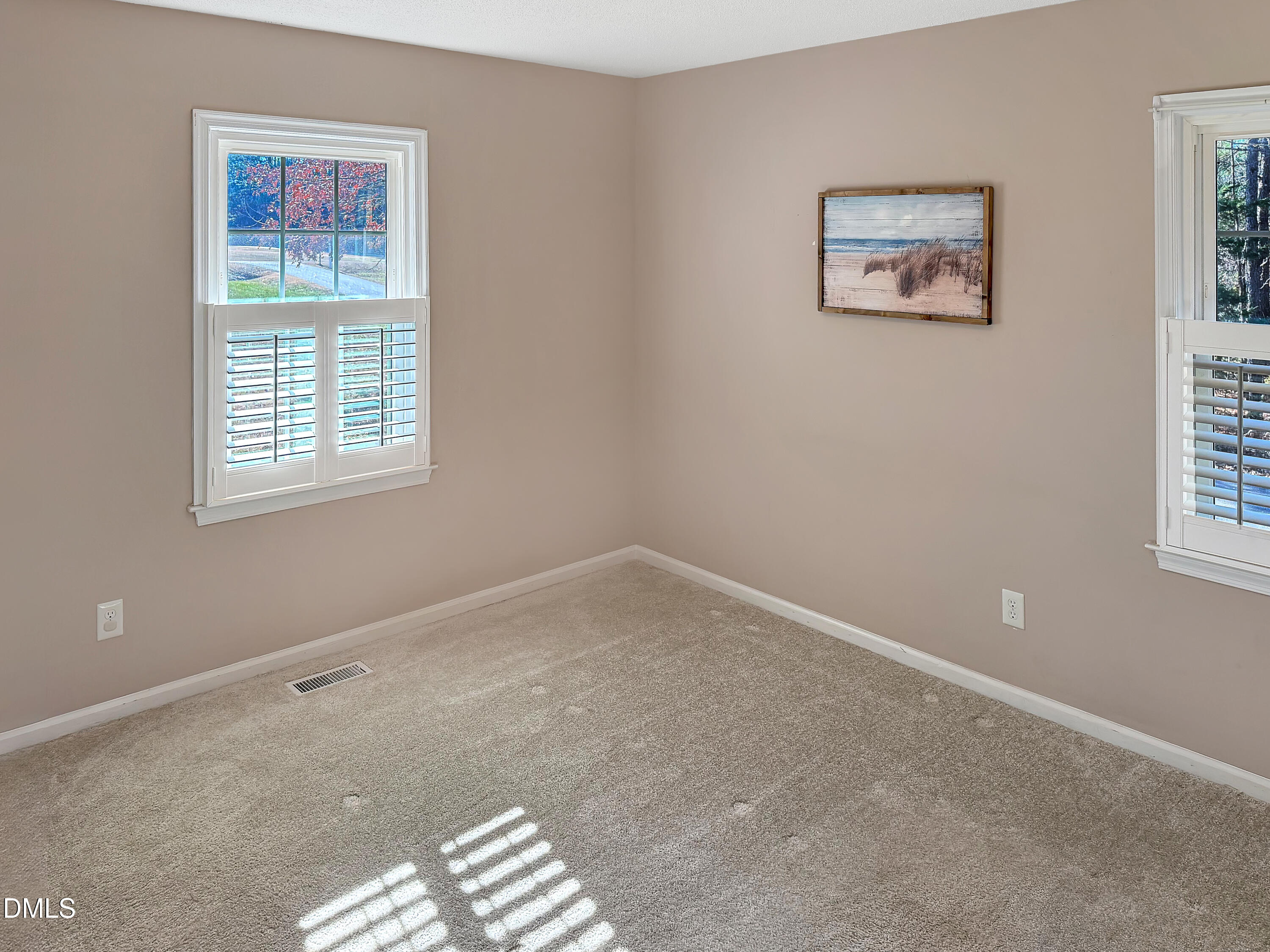 573 Arnold Road Louisburg, NC 27549 - Photo 11 of 16 a view of an empty room with a window
