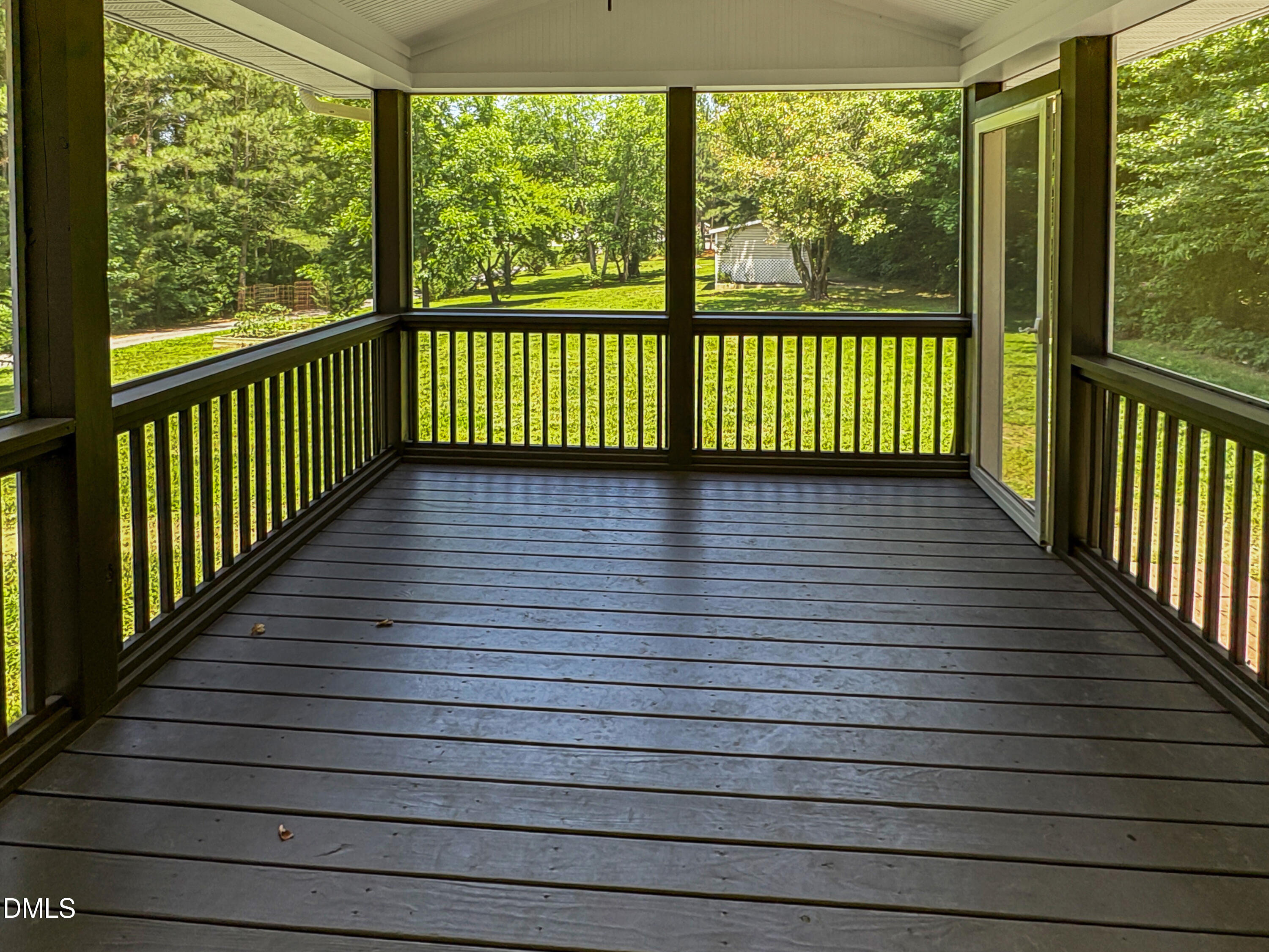 573 Arnold Road Louisburg, NC 27549 - Photo 4 of 16 a view of a balcony with wooden floor
