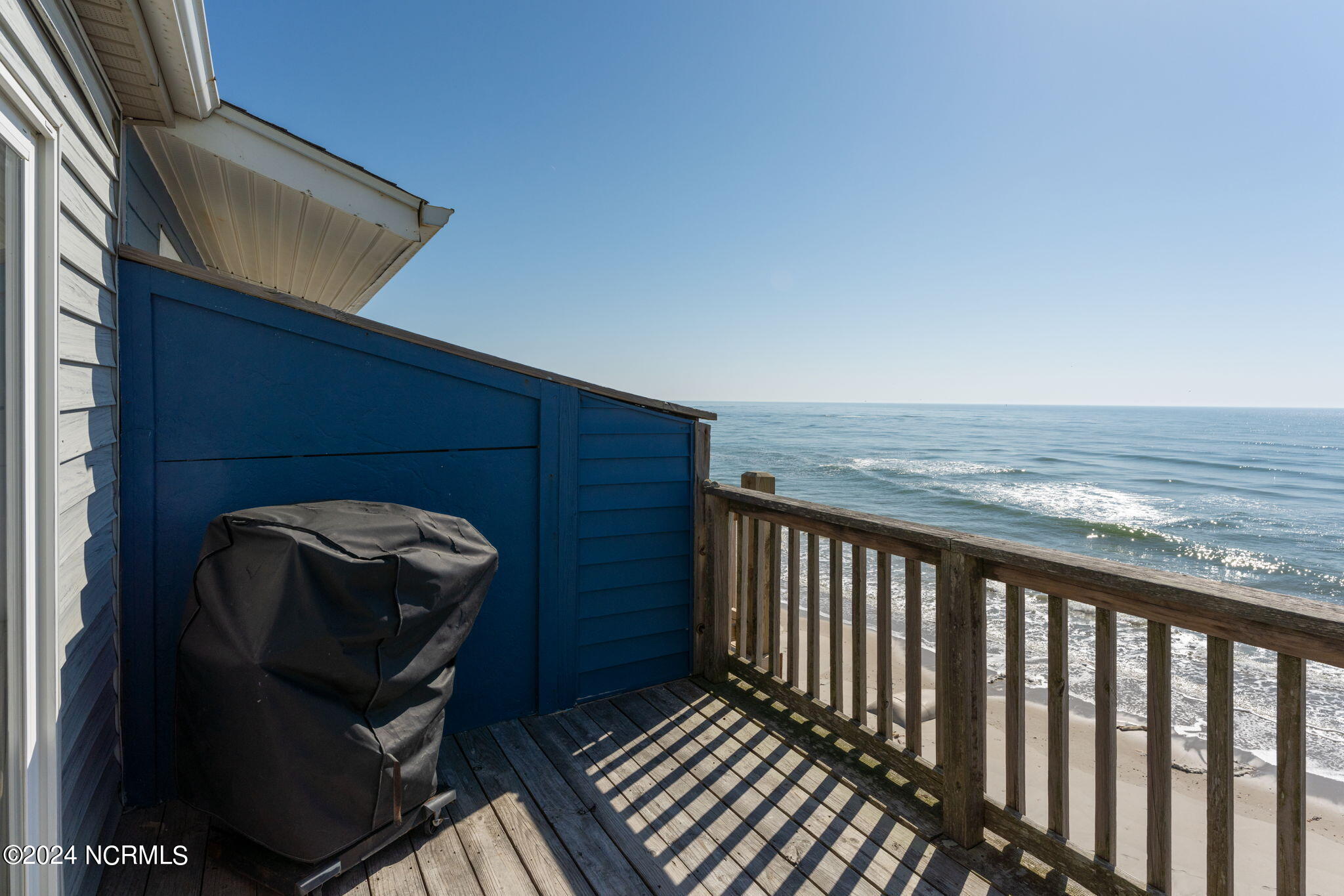 2342 New River Inlet Road, Unit 1 North Topsail Beach, NC 28460 - Photo 36 of 50 Family room Deck