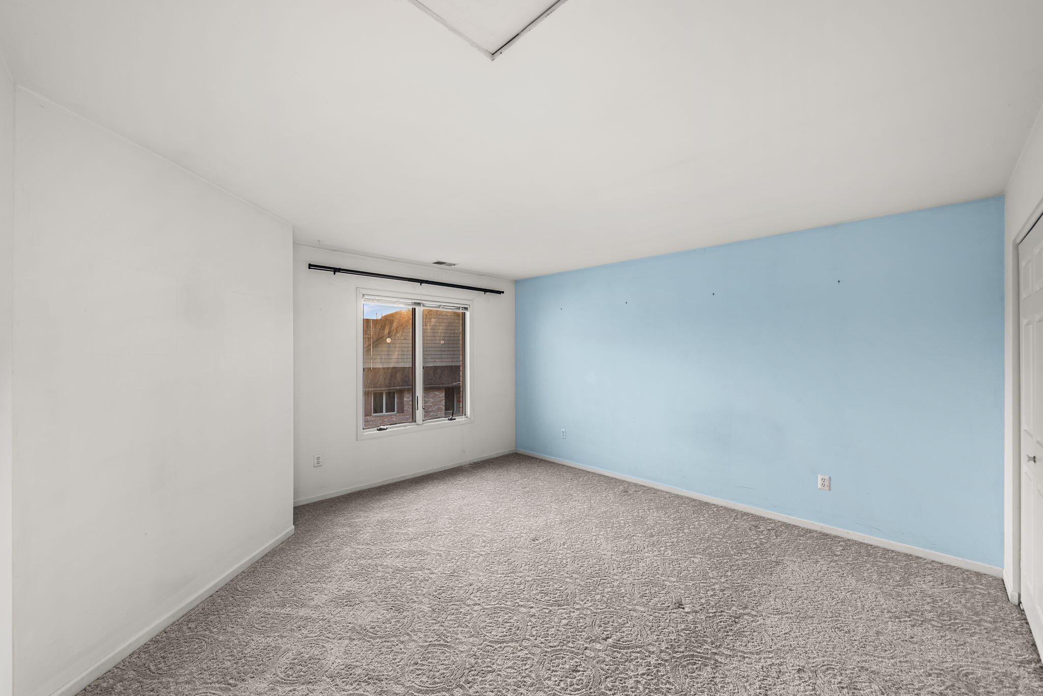 1345 West 94th Court Crown Point, IN 46307 - Photo 17 of 20 an empty room with a window