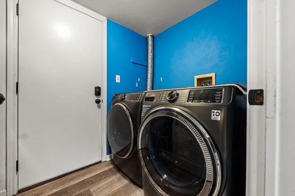 a utility room with dryer and washer