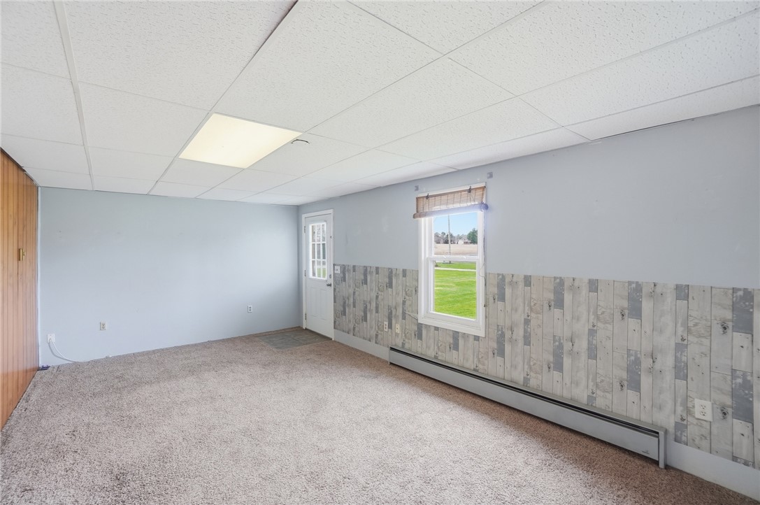 1166 West Sparrow Road Springfield, OH 45502 - Photo 25 of 40 This versatile room offers ample space for various uses, bathed in natural light.
