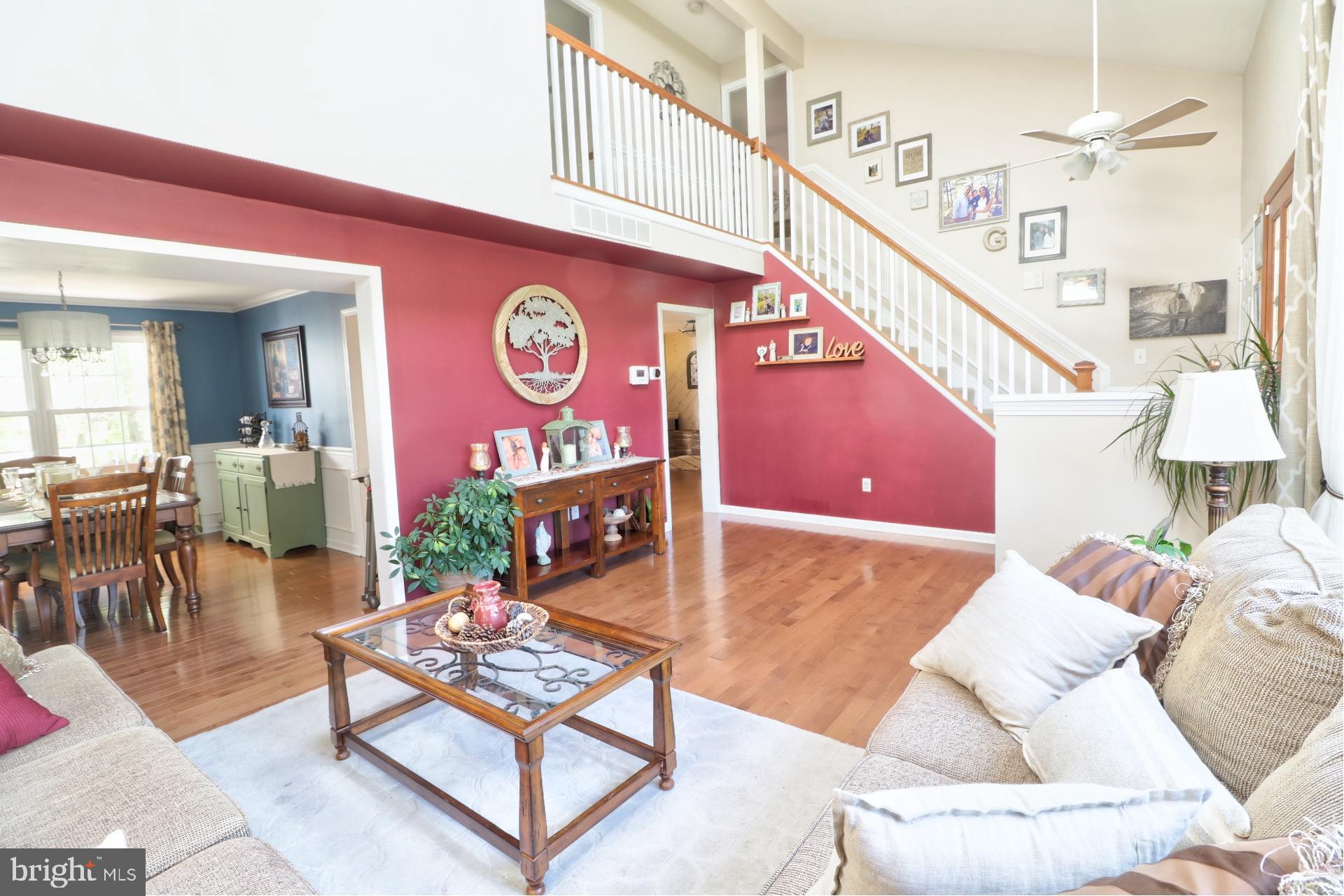 4701 Vicky Road Baltimore, MD 21236 - Photo 22 of 39 a living room with furniture and a clock