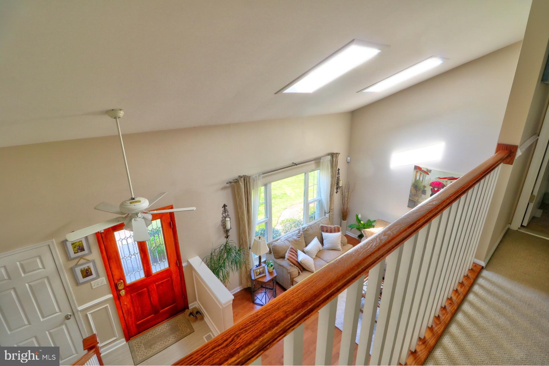 4701 Vicky Road Baltimore, MD 21236 - Photo 24 of 39 a view of an entryway wooden floor and furniture