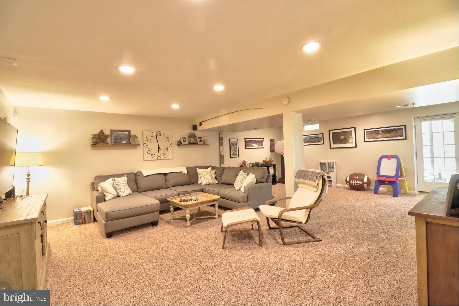 4701 Vicky Road Baltimore, MD 21236 - Photo 32 of 39 a living room with furniture and wooden floor