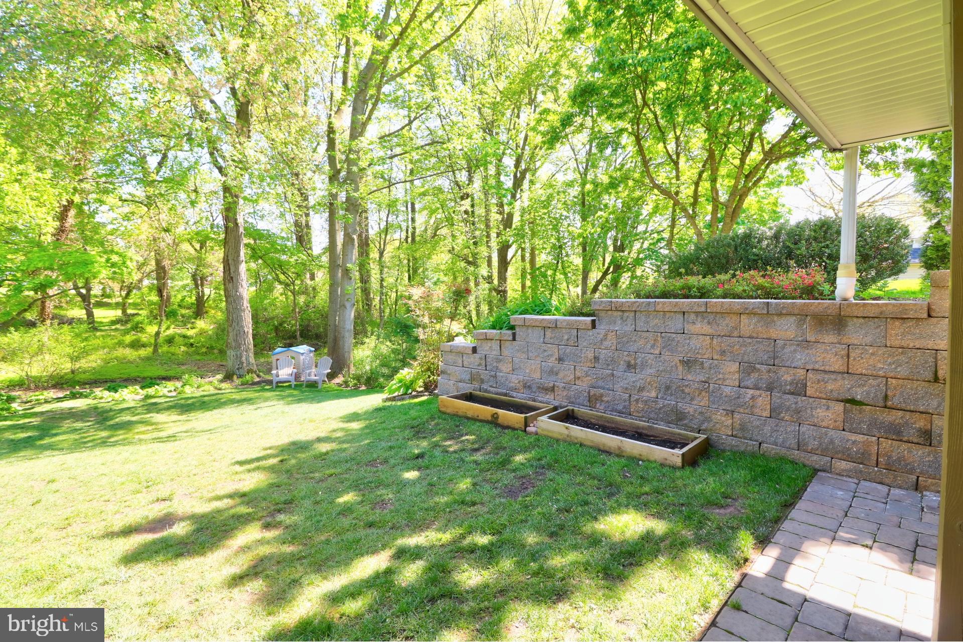 4701 Vicky Road Baltimore, MD 21236 - Photo 36 of 39 a view of a backyard with a tree
