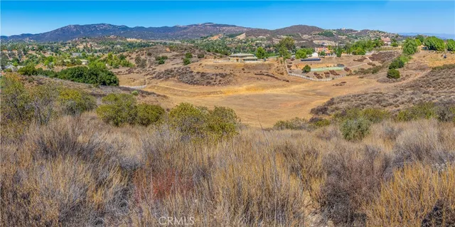 a view of a lake with mountains in the background