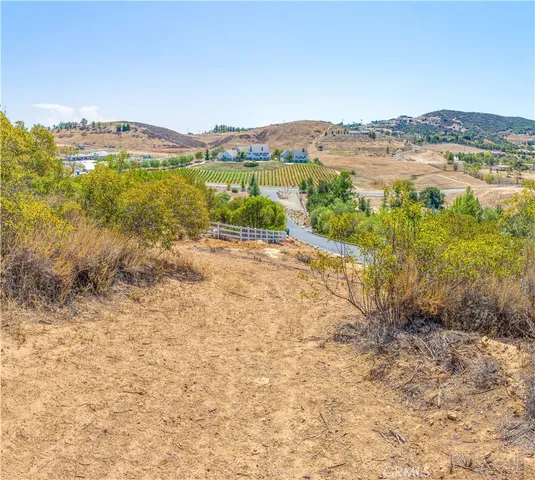 a view of lake with mountain in the background