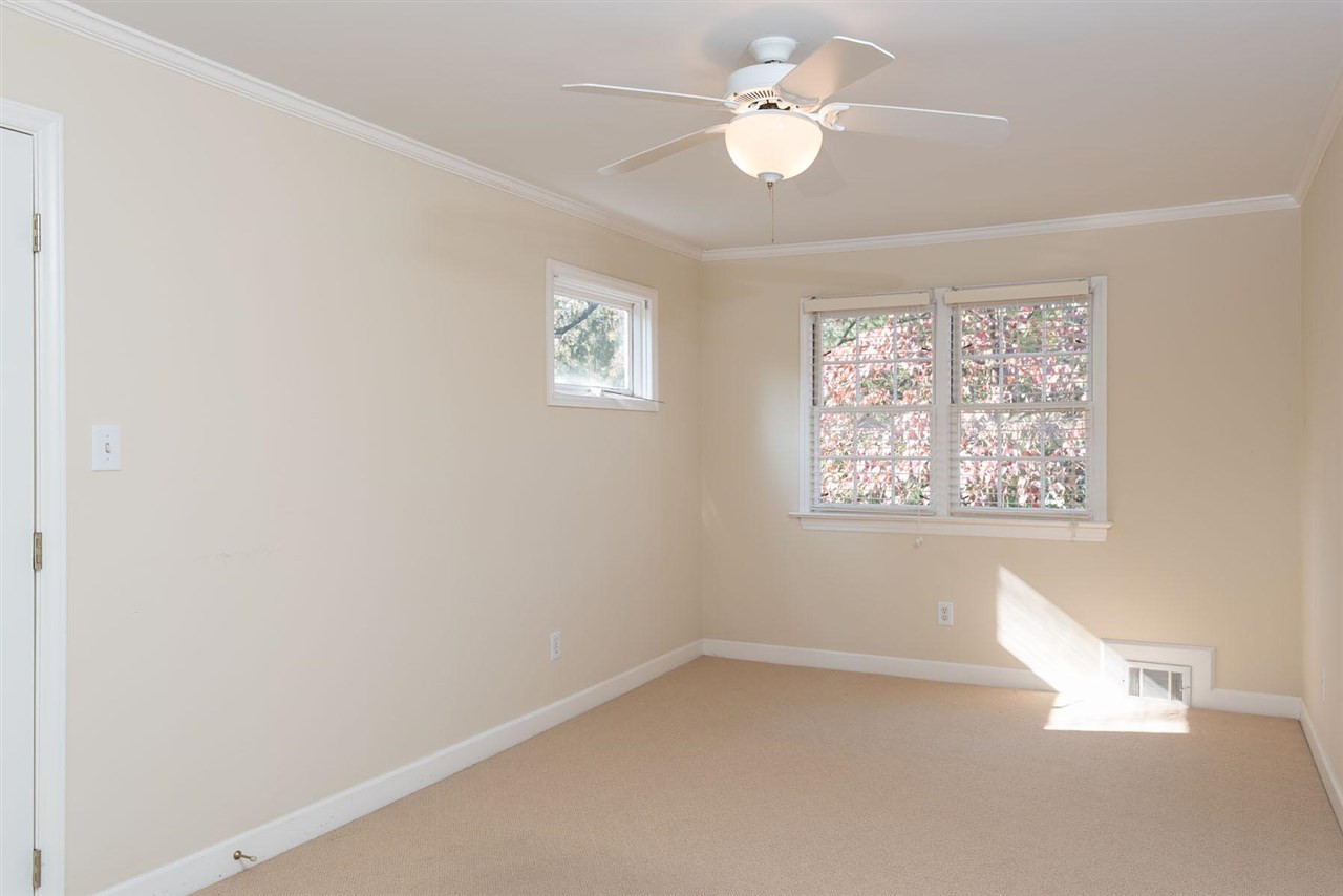 1409 Hathaway Road Raleigh, NC 27608 - Photo 15 of 25 an empty room with a window