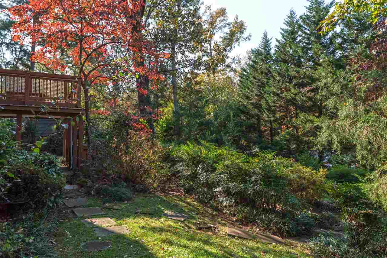 1409 Hathaway Road Raleigh, NC 27608 - Photo 21 of 25 a view of backyard with green space