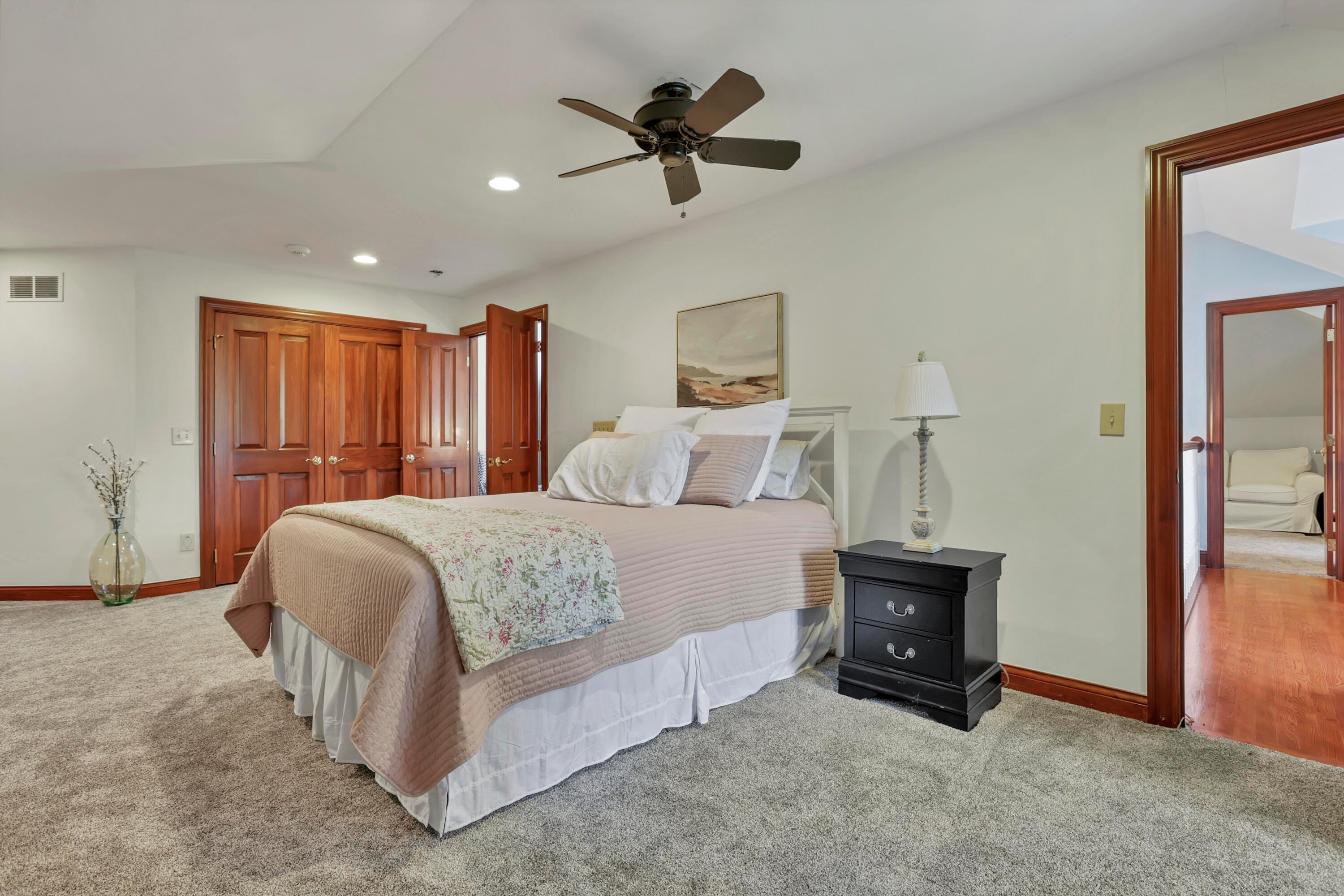 3575 State Rte 37 West Delaware, OH 43015 - Photo 90 of 106 Spacious room featuring light-colored walls, ceiling fan, recessed lighting, and rich wood-paneled bi-fold closet doors