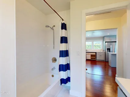 a view of bathroom and bathroom with a tub