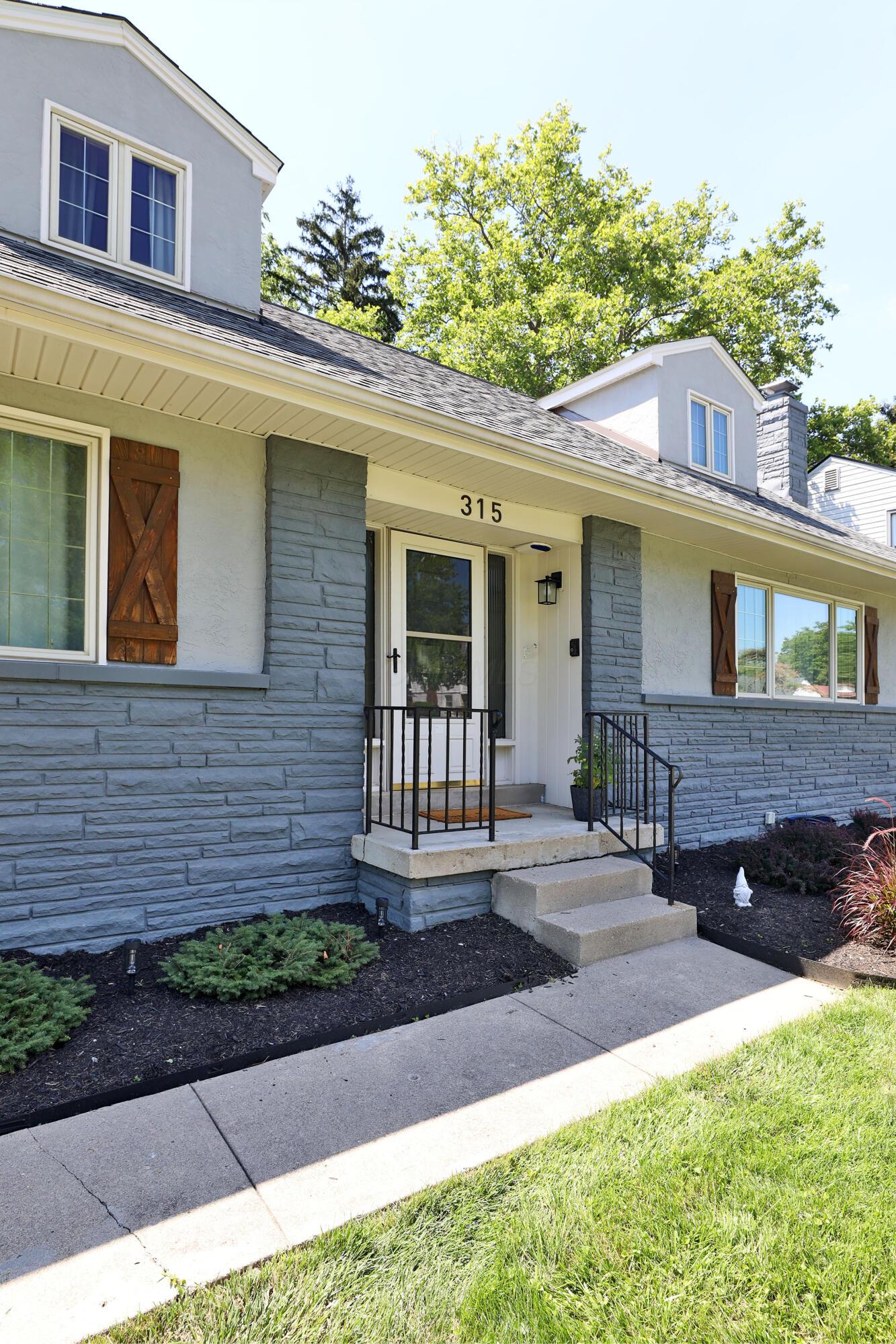 315 South Kellner Road Columbus, OH 43209 - Photo 3 of 51 Stone and stucco front, concrete walkway
