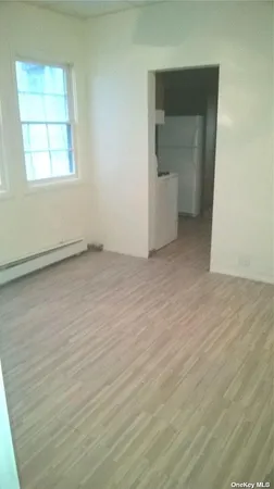 an empty room with a bathroom