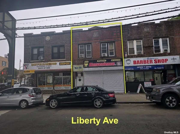 a car parked in front of a building