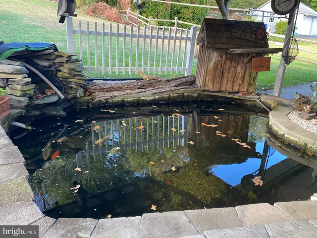 a house with trees in the background