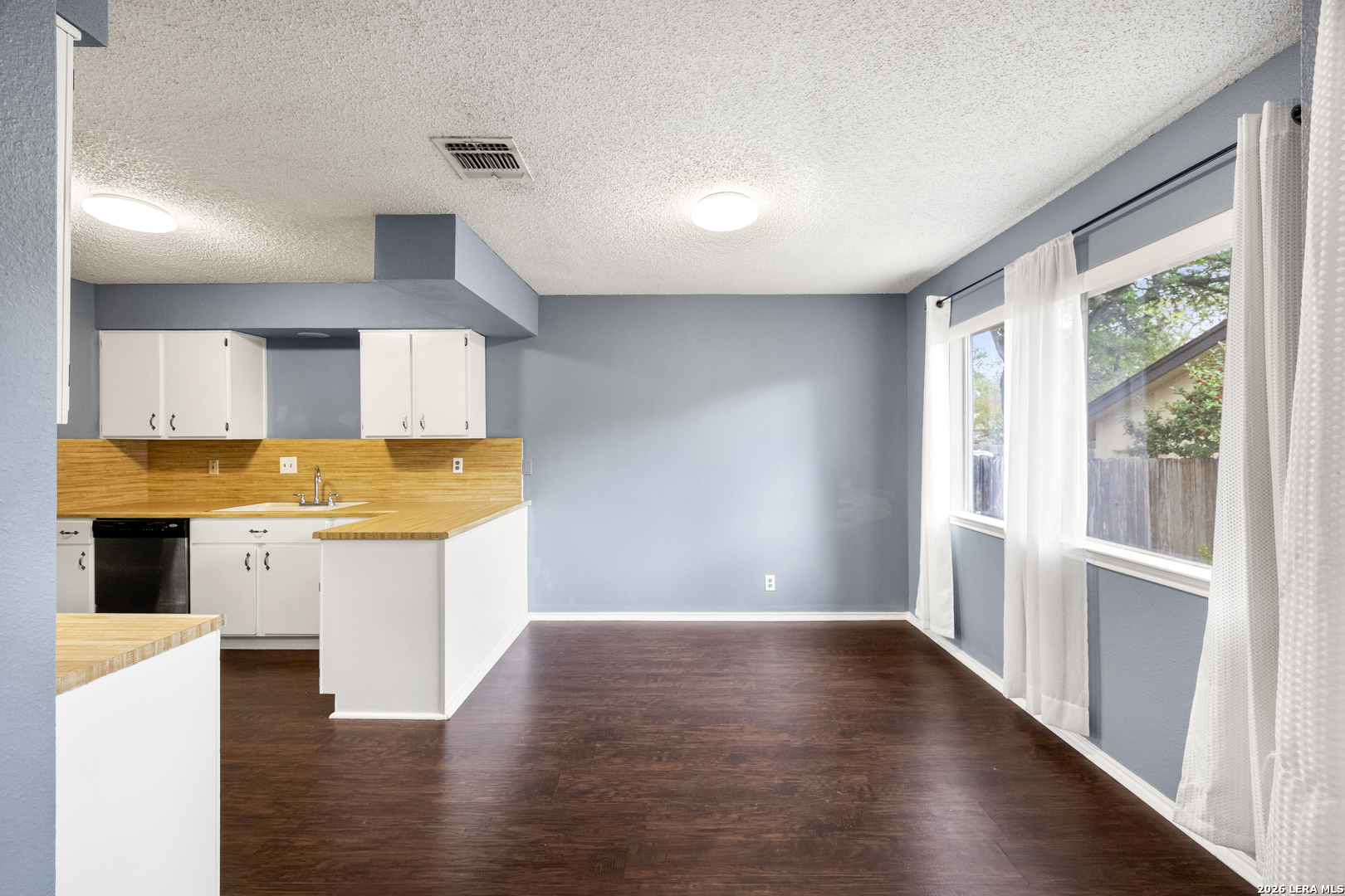 9334 Dover Ridge San Antonio, TX 78250 - Photo 11 of 42 a view of kitchen with wooden floor
