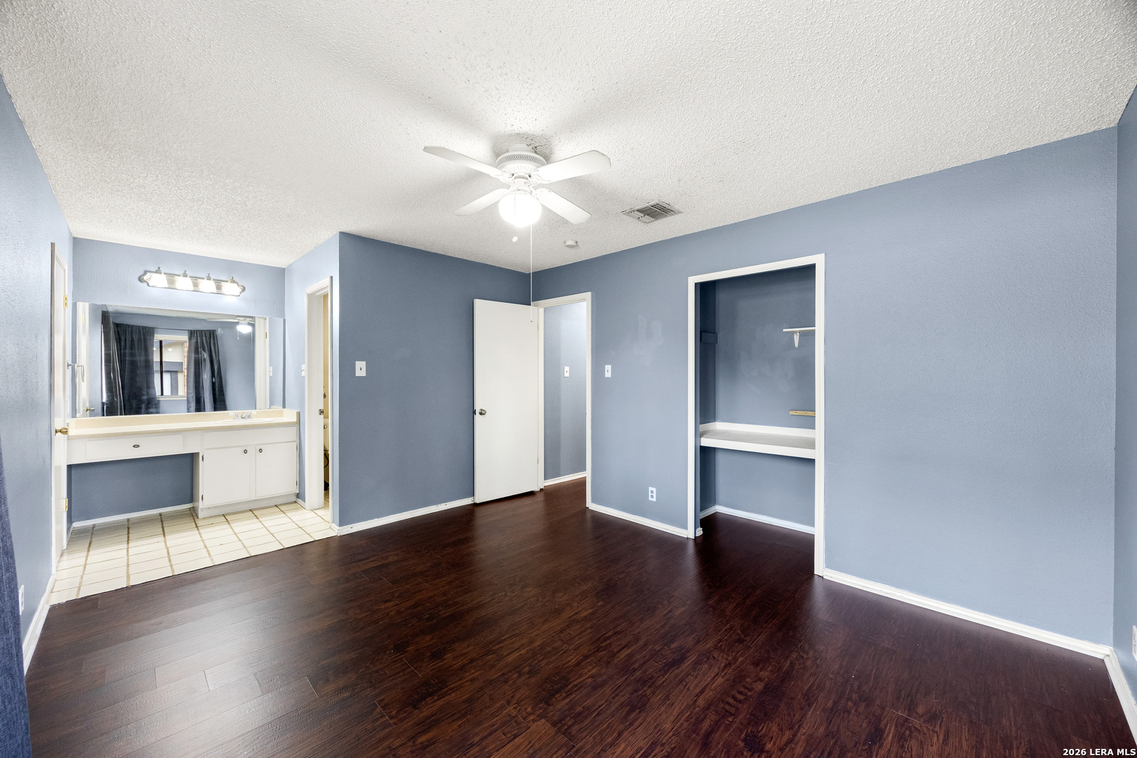 9334 Dover Ridge San Antonio, TX 78250 - Photo 24 of 42 a view of an empty room with window and wooden floor