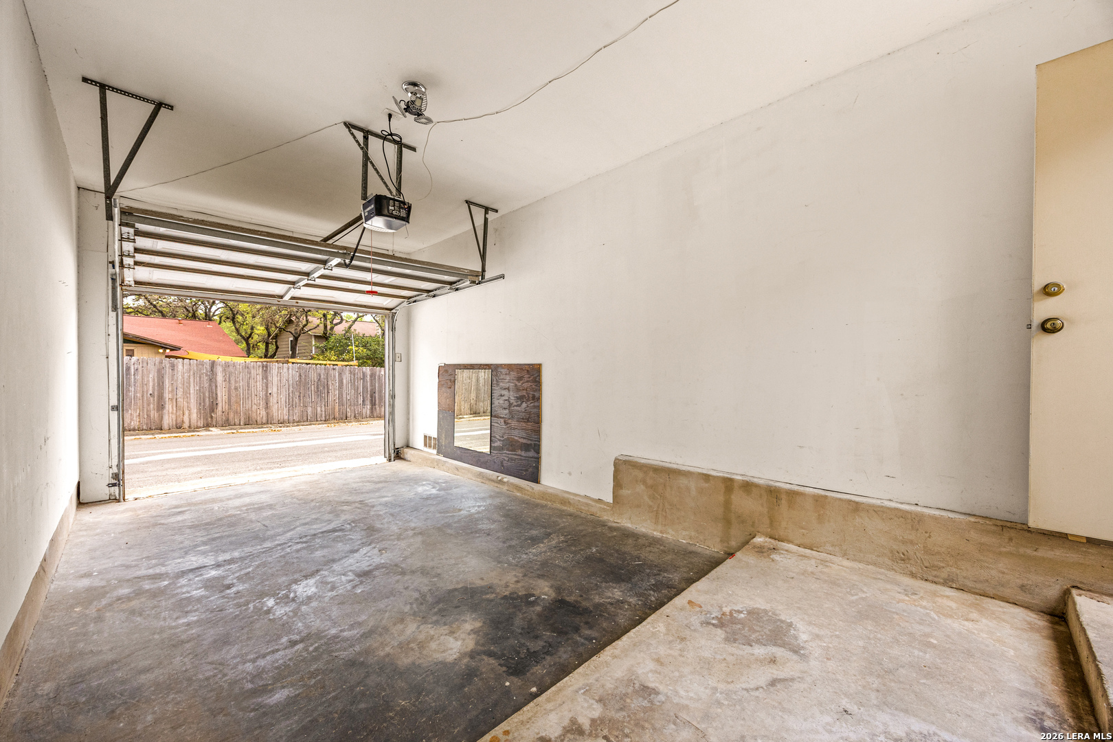 9334 Dover Ridge San Antonio, TX 78250 - Photo 25 of 42 a view of a livingroom with wooden floor and a ceiling fan