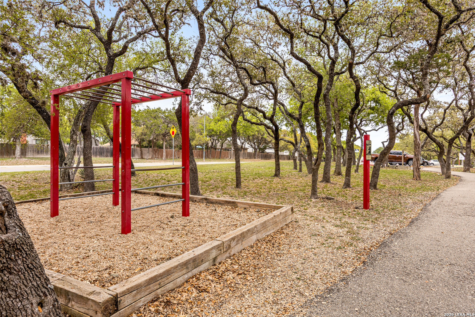 9334 Dover Ridge San Antonio, TX 78250 - Photo 37 of 42 a backyard of a house with table and chairs