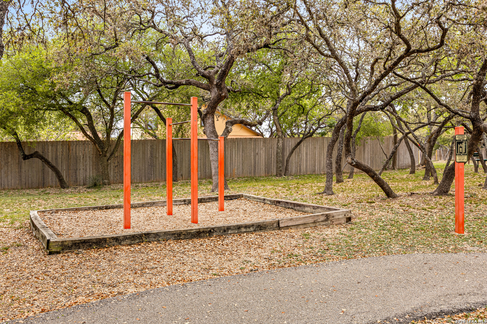 9334 Dover Ridge San Antonio, TX 78250 - Photo 38 of 42 a view of a yard with a tree