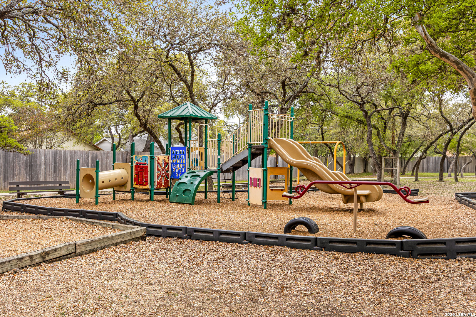 9334 Dover Ridge San Antonio, TX 78250 - Photo 40 of 42 a view of a park with iron fence