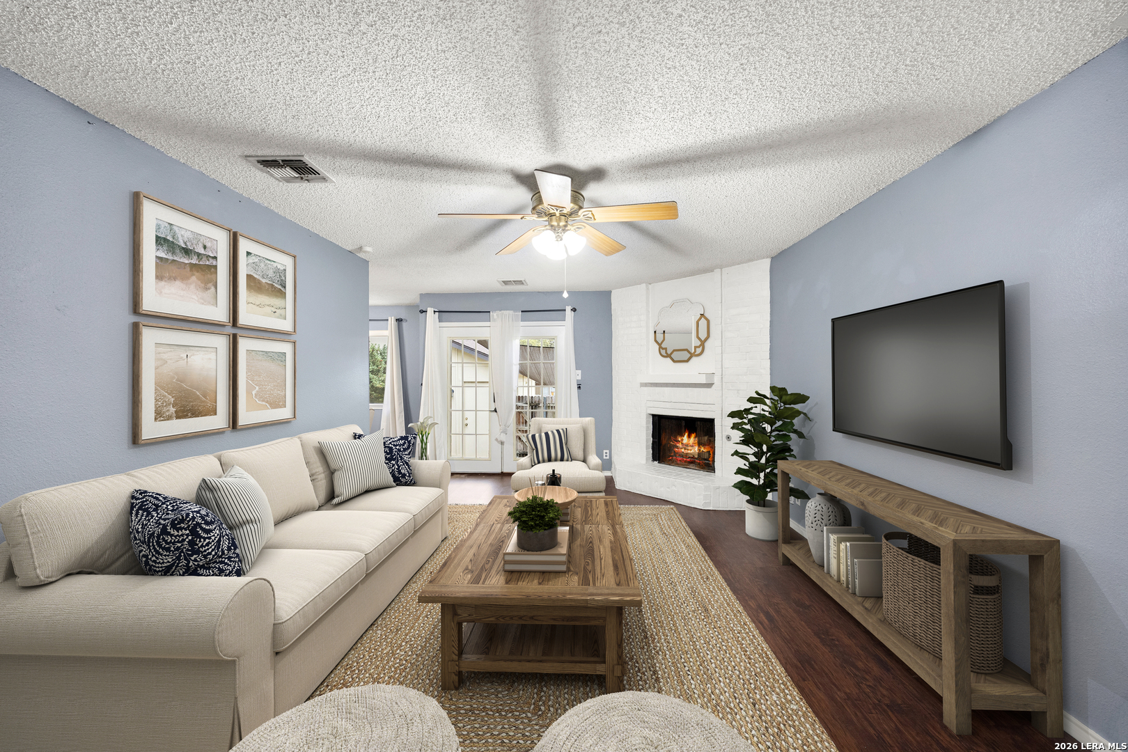 9334 Dover Ridge San Antonio, TX 78250 - Photo 5 of 42 a living room with furniture and a flat screen tv