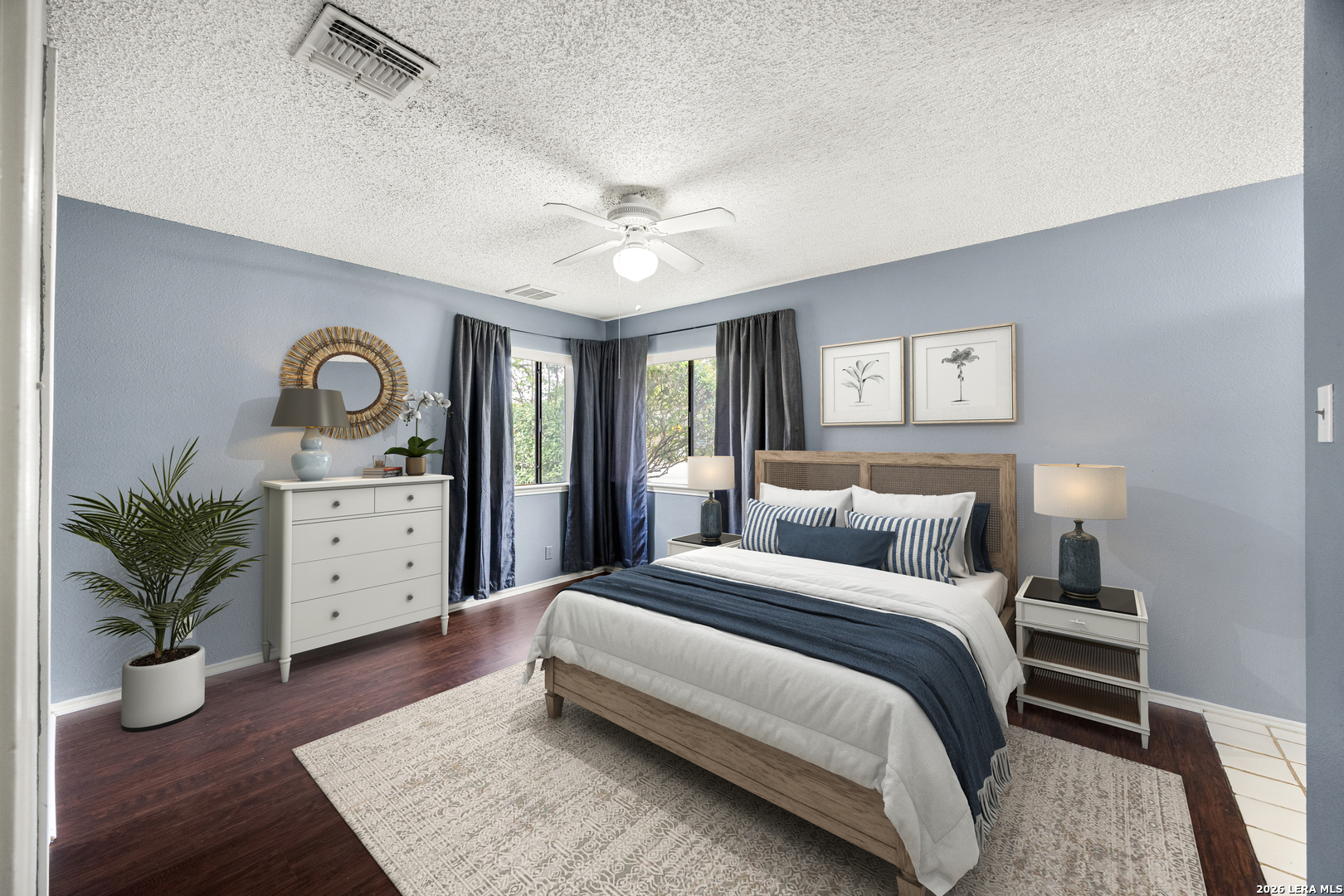 9334 Dover Ridge San Antonio, TX 78250 - Photo 7 of 42 a spacious bedroom with a large bed and a potted plant